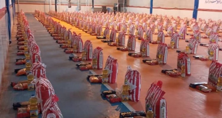 توزیع 700 بسته معیشتی در شهرستان صحنه + عکس