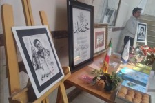 نمایشگاه طراحی ونقاشی پرتره شانزده شهید مدافع حرم استان کرمانشاه در صحنه
