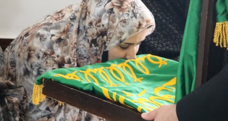 دیدار خدام امام رضا(ع) با خانواده شهدای صحنه